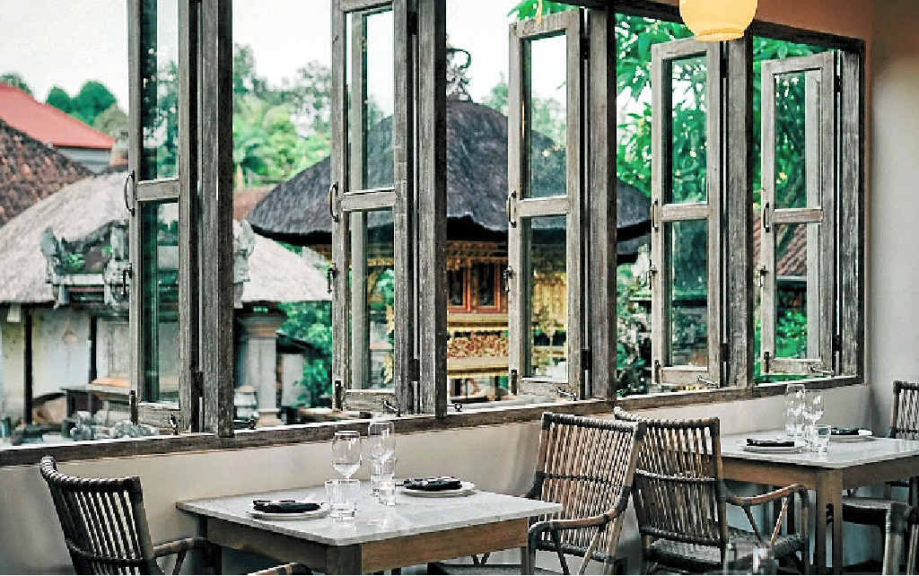 The Asian-inspired street facade of Hujan Locale in Ubud, Bali. The Asian-inspired street facade of Hujan Locale in Ubud, Bali.